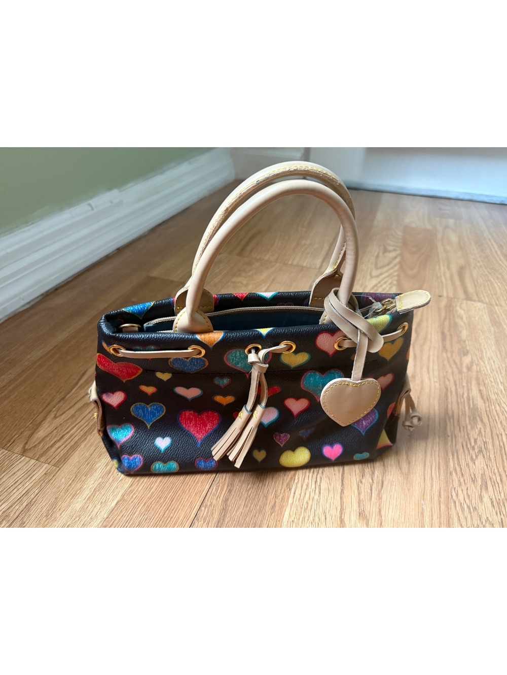 Small Black Handbag with Multicolor Heart Print and Beige Handles